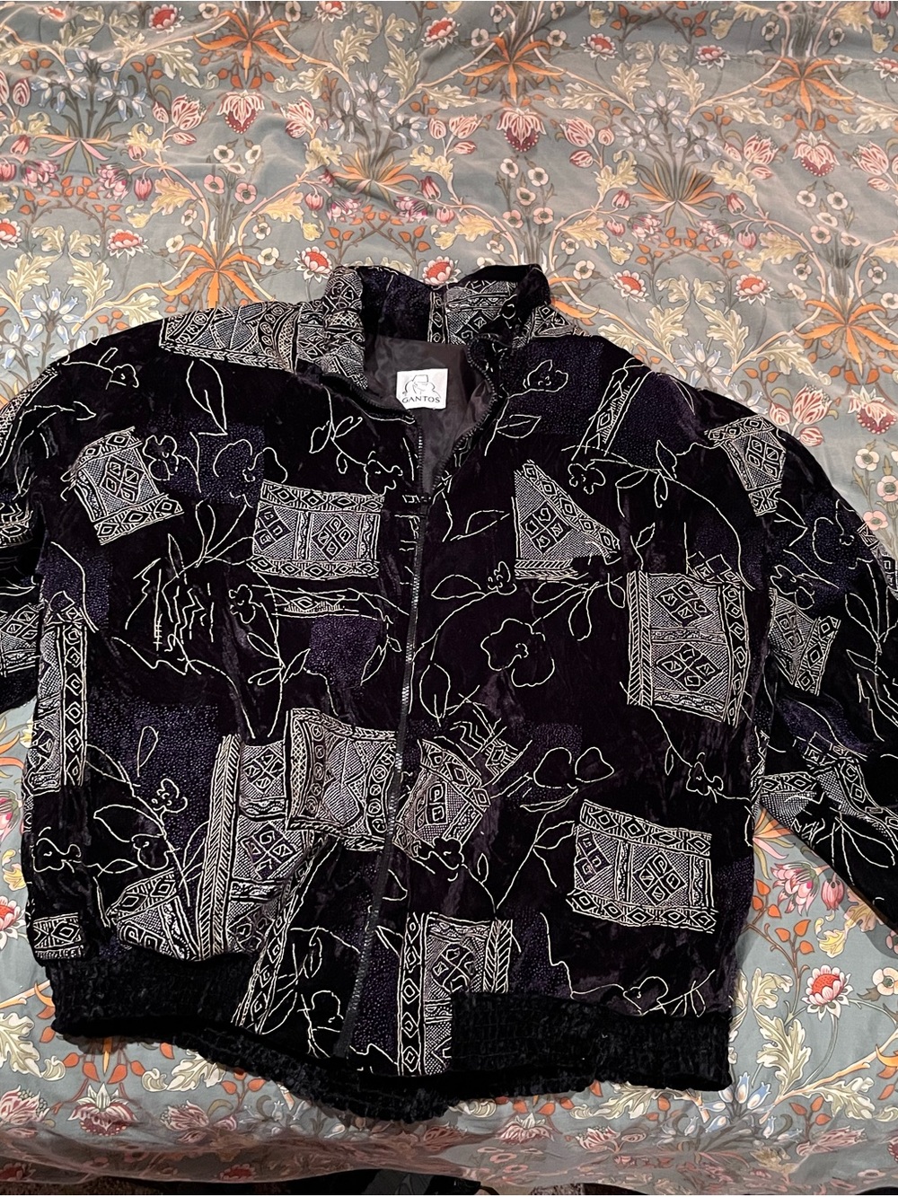 Vintage-Inspired Black Bomber Jacket with Ivory Pattern